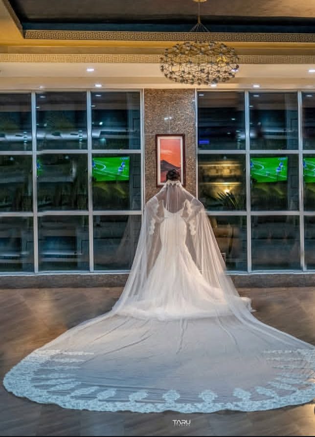 Cathedral-length veil spread across the floor — Gia Bridals, Port Harcourt