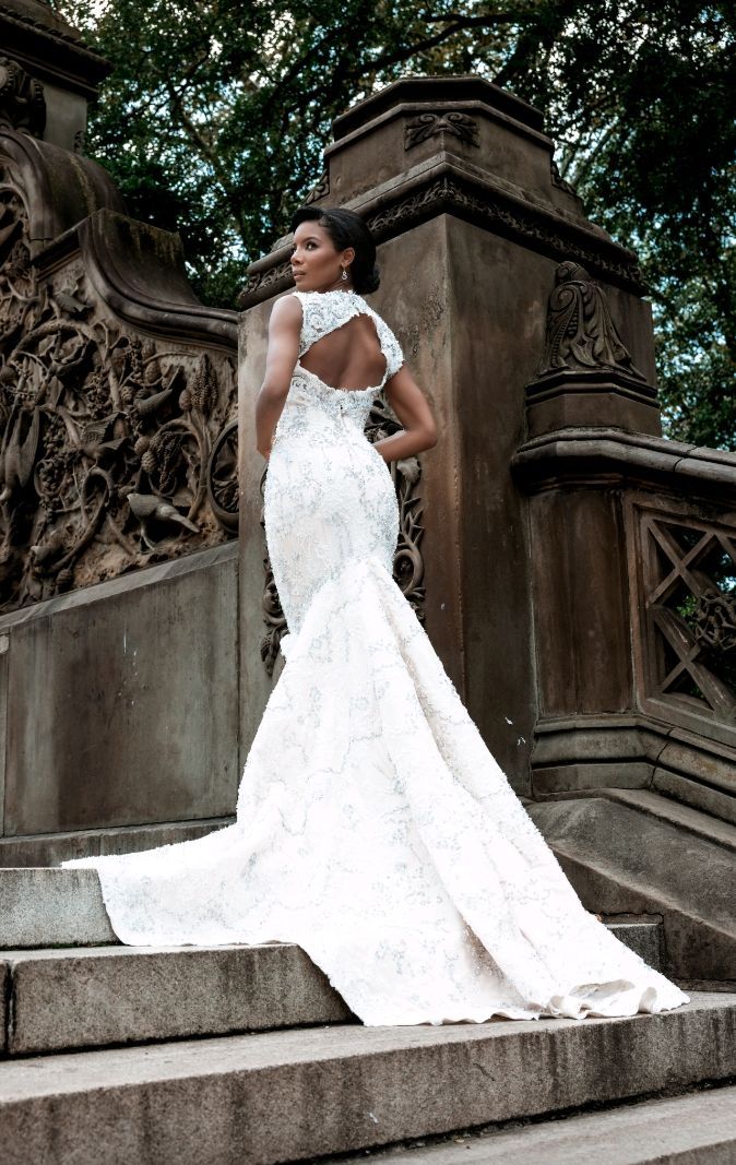Lace mermaid gown on stone steps — Gia Bridals, Port Harcourt