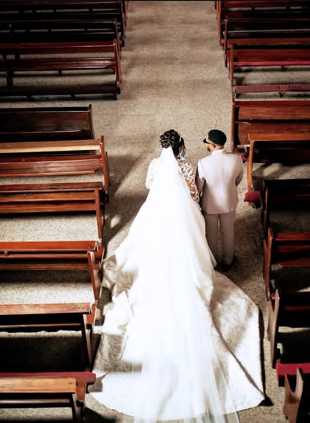 Couple walking out of the church together — Gia Bridals, Port Harcourt